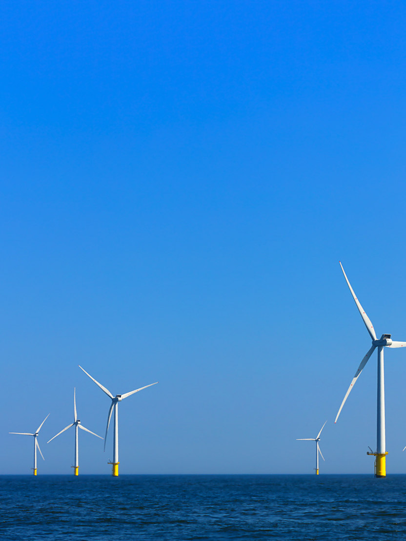view of windmills of Rampion windfarm off the coast of Brighton, Sussex, UK
