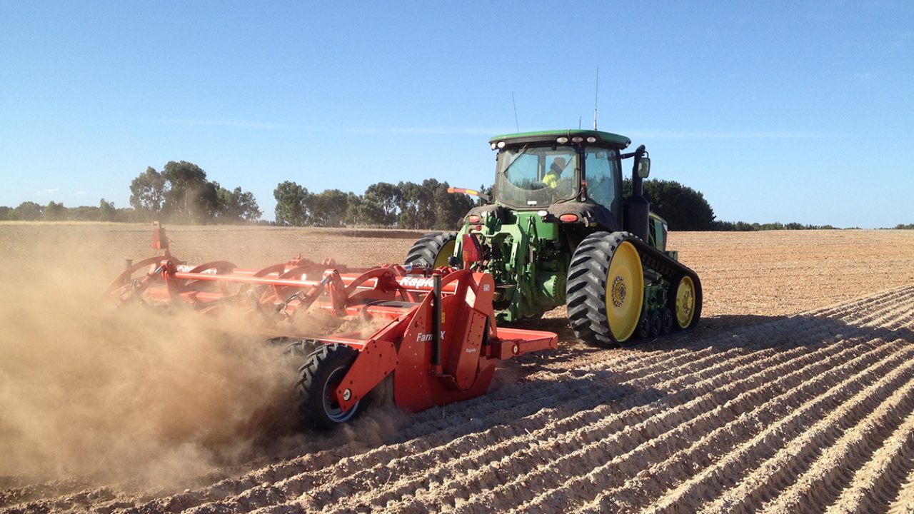 Tractor ploughing field